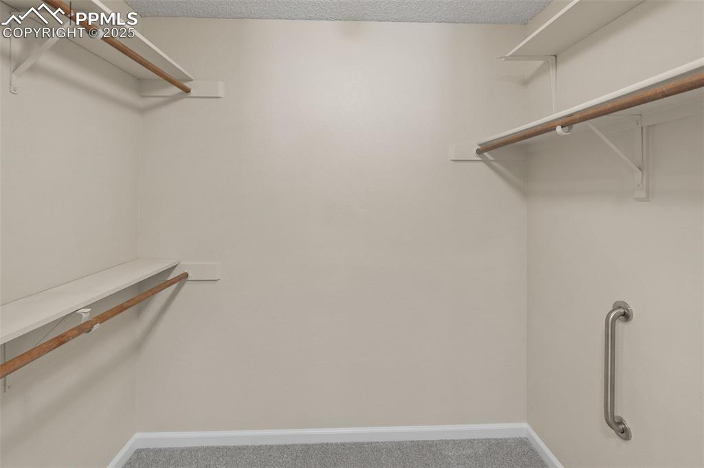 Image 18 of 28: Master Bedroom