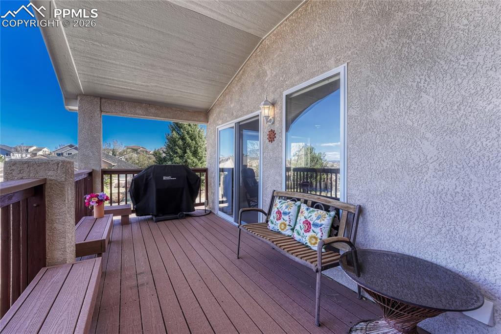 Image 14 of 50: Covered composite deck with natural gas stub...