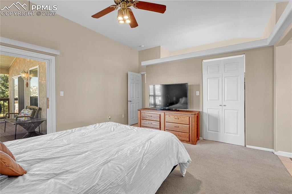 Image 18 of 50: ...and walk-out to the covered deck.