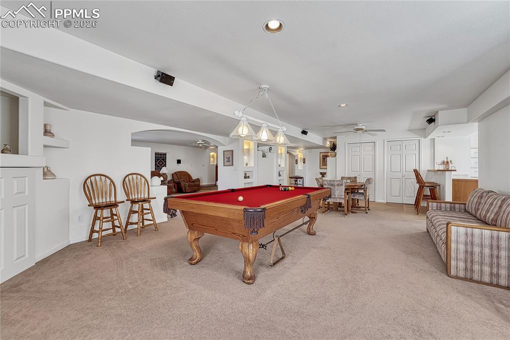 Image 39 of 50: Imagine the possibilities with this finished basement!