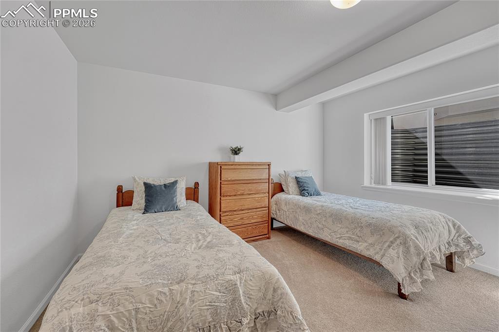 Image 47 of 50: Second of two basement bedrooms...