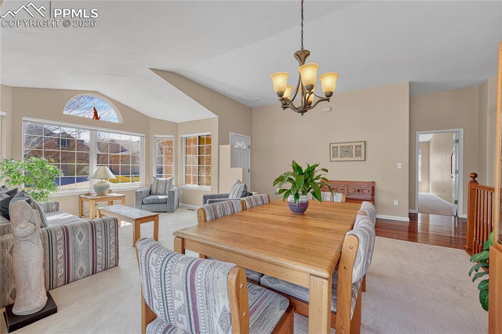 Image 7 of 50: Dining area also has a vaulted ceiling.