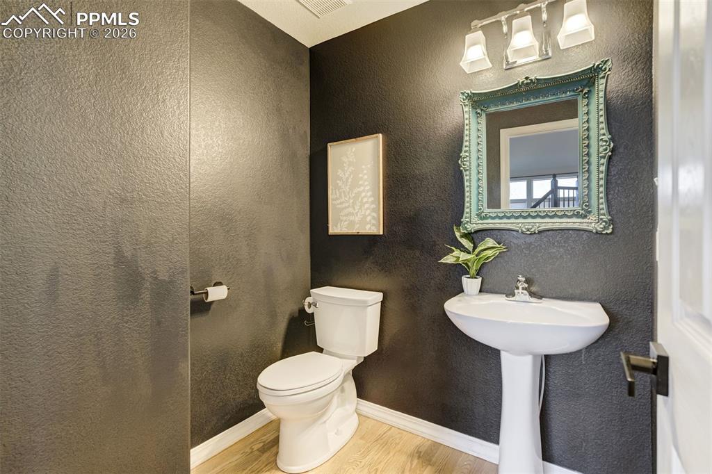 Image 18 of 45: Powder bathroom on the main level.