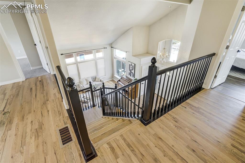 Image 19 of 45: Second floor landing area with all new wood flooring as well.