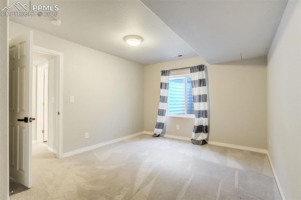 Image 38 of 45: 5th bedroom in the basement.