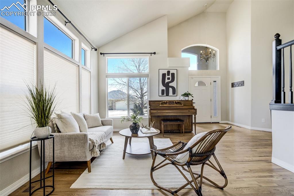 Image 4 of 45: A front-row seat to natural light—this formal living space sets the tone th