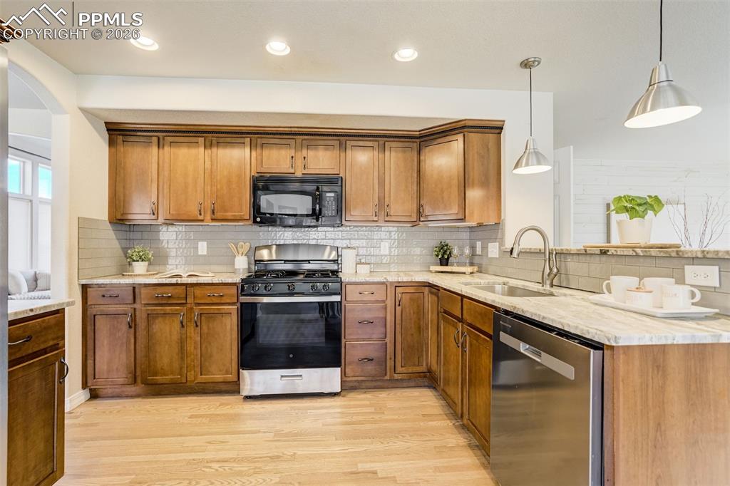 Image 8 of 45: A kitchen that means business—style, function, and room to actually cook.