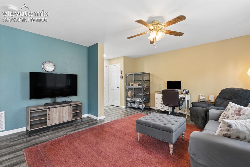 Image 3 of 35: Wood-finish flooring throughout