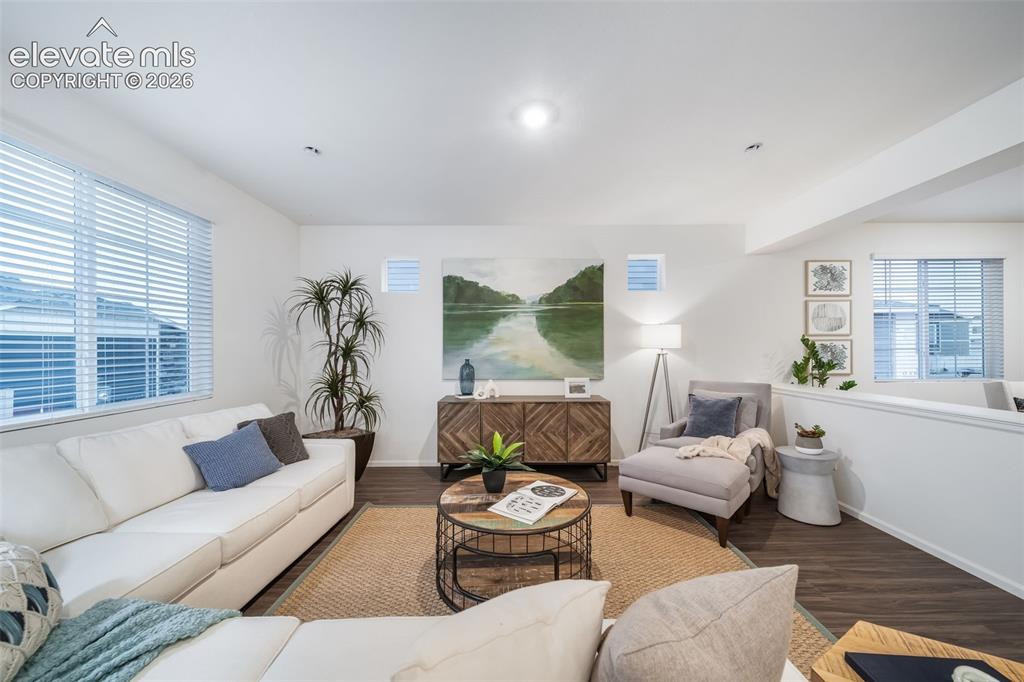 Image 16 of 41: Recessed lighting, wood-finish flooring, and white walls
*photos  of a mod