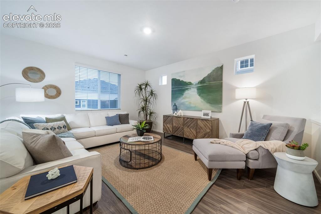 Image 20 of 41: White walls, recessed lighting, and wood-finish flooring
*photos  of a mod