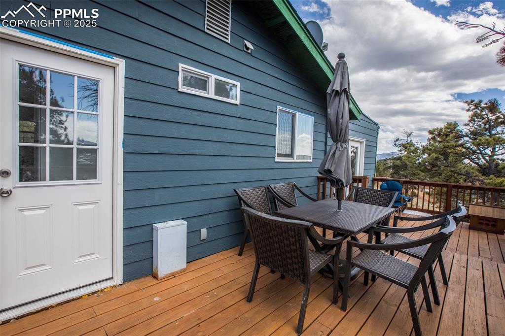 Image 36 of 36: Deck with outdoor dining space