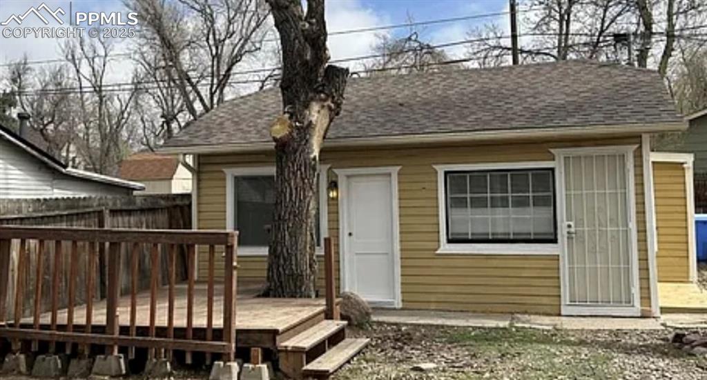 Image 2 of 49: Cottage with a deck