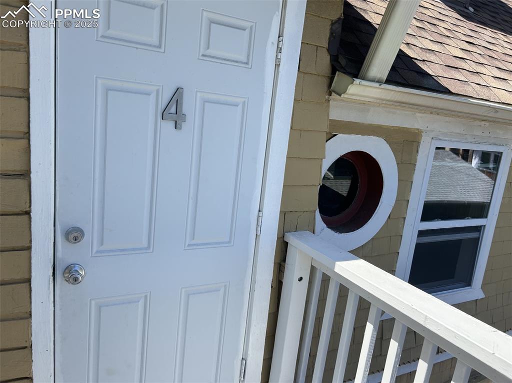 Image 34 of 49: APT 4 exterior entry