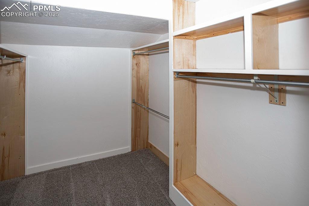 Image 11 of 23: Primary bedroom closet