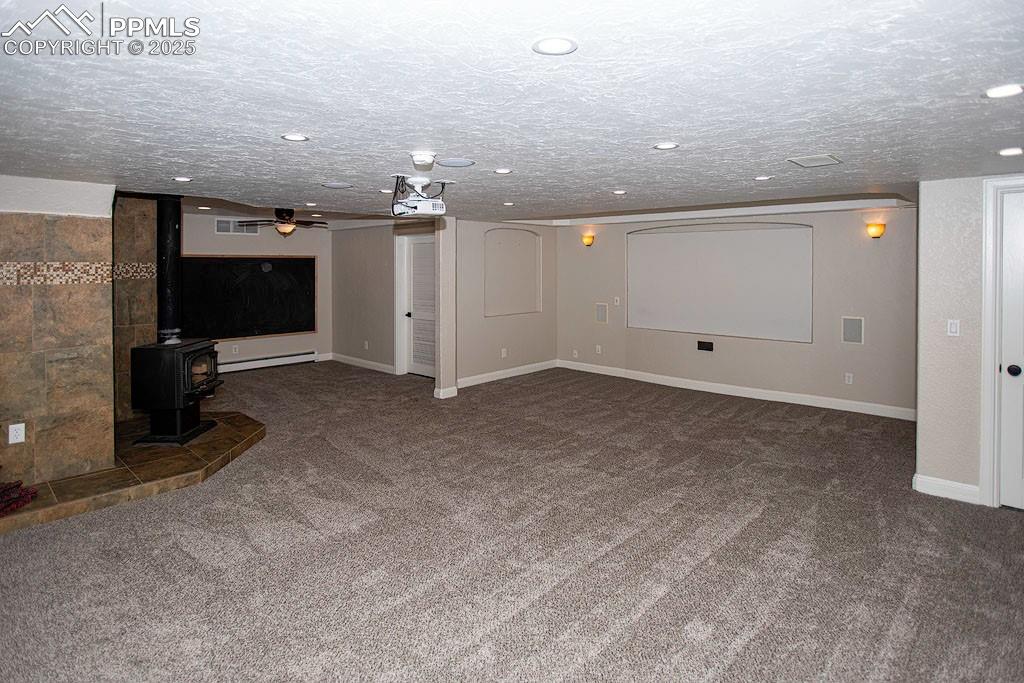 Image 15 of 23: Theater room lower level