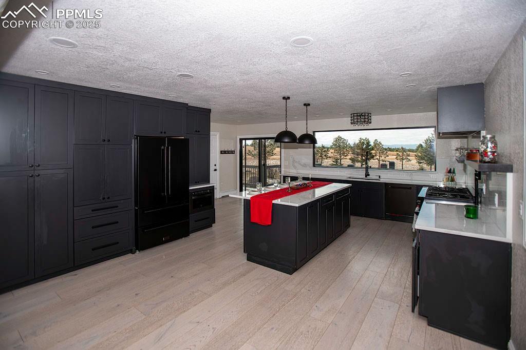 Image 7 of 23: Kitchen with view of the mountains