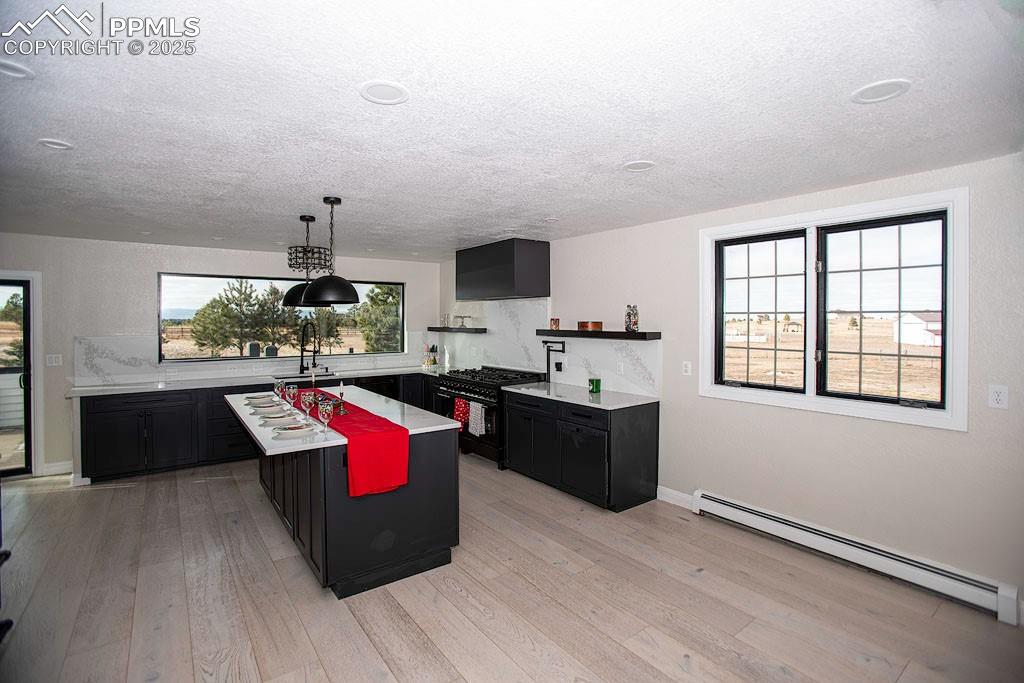 Image 8 of 23: Kitchen view from family room.
