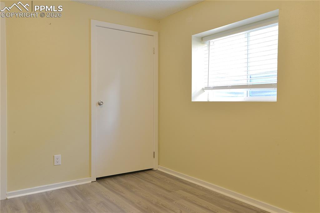 Image 23 of 25: And a bright sunny 4th bedroom