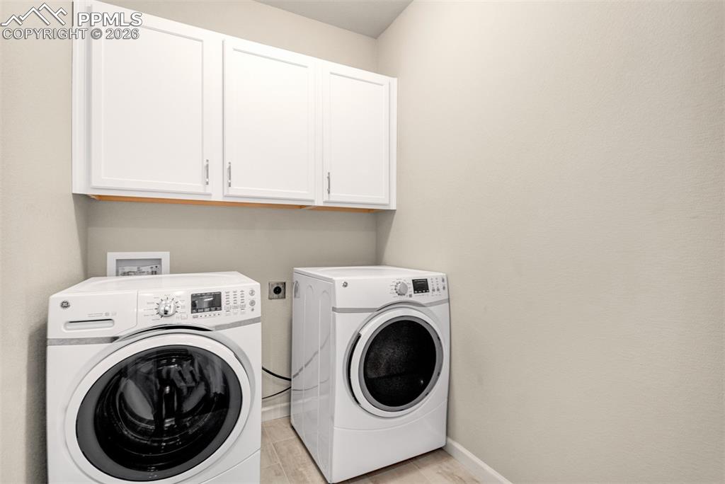 Image 21 of 29: Main level laundry with electric hookups