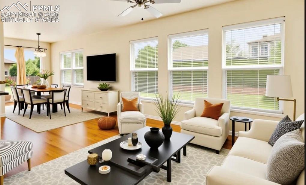 Image 19 of 42: Virtually staged hearth room off kitchen with nook & walkout