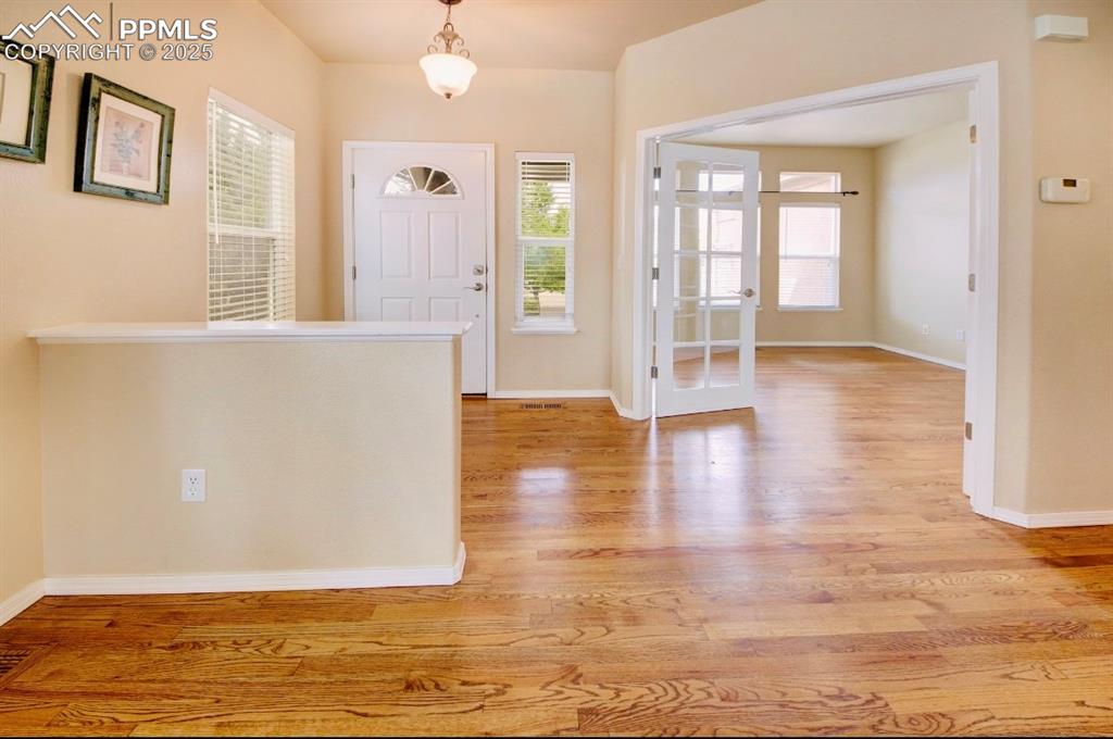 Image 2 of 42: Foyer featuring light wood-style floors