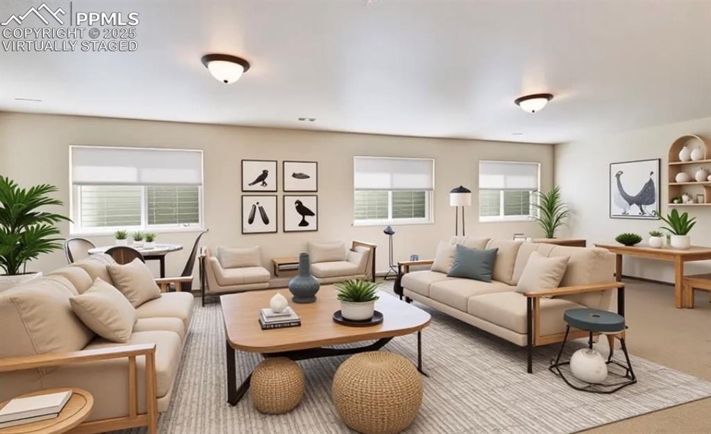 Image 32 of 42: Virtually staged rec room in lower level