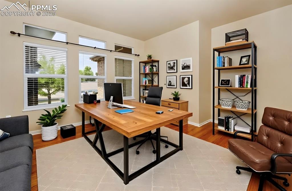 Image 8 of 42: Virtually stage office, located off foyer