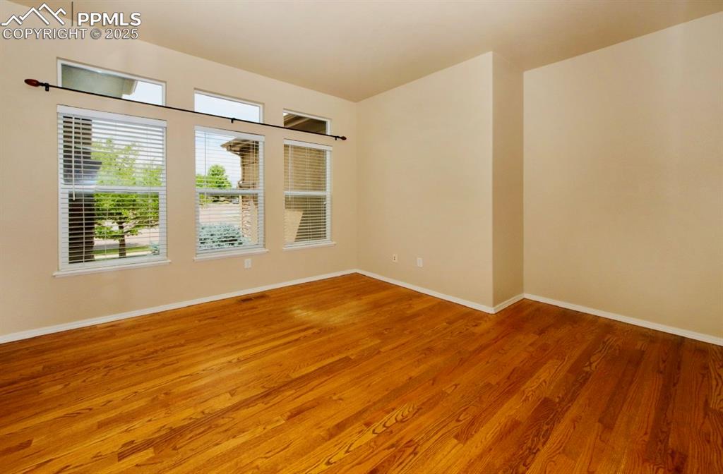 Image 9 of 42: Spare room featuring light wood finished floors
