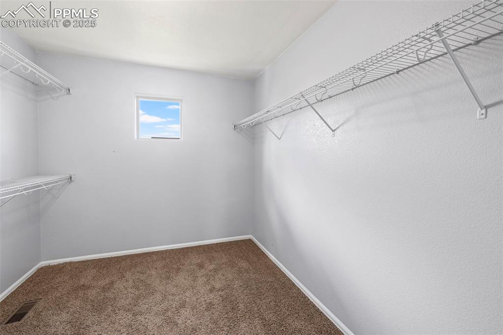 Image 22 of 38: Primary Walk In Closet 