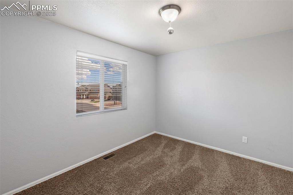 Image 26 of 38: Bedroom