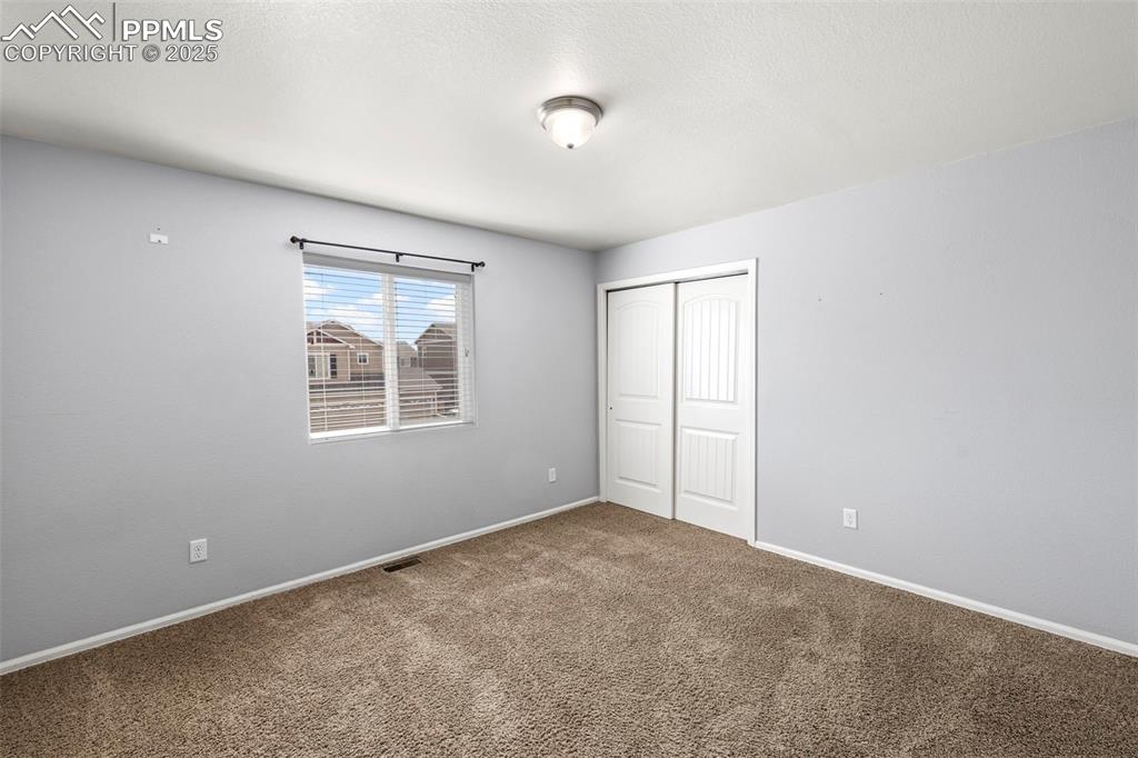 Image 28 of 38: Bedroom