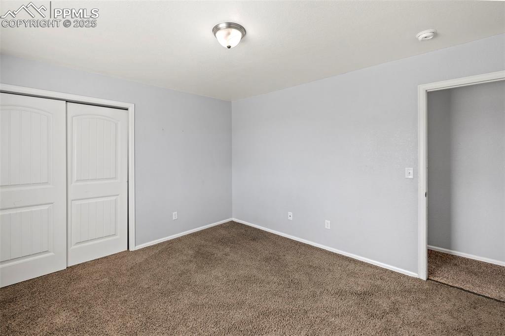 Image 29 of 38: Bedroom