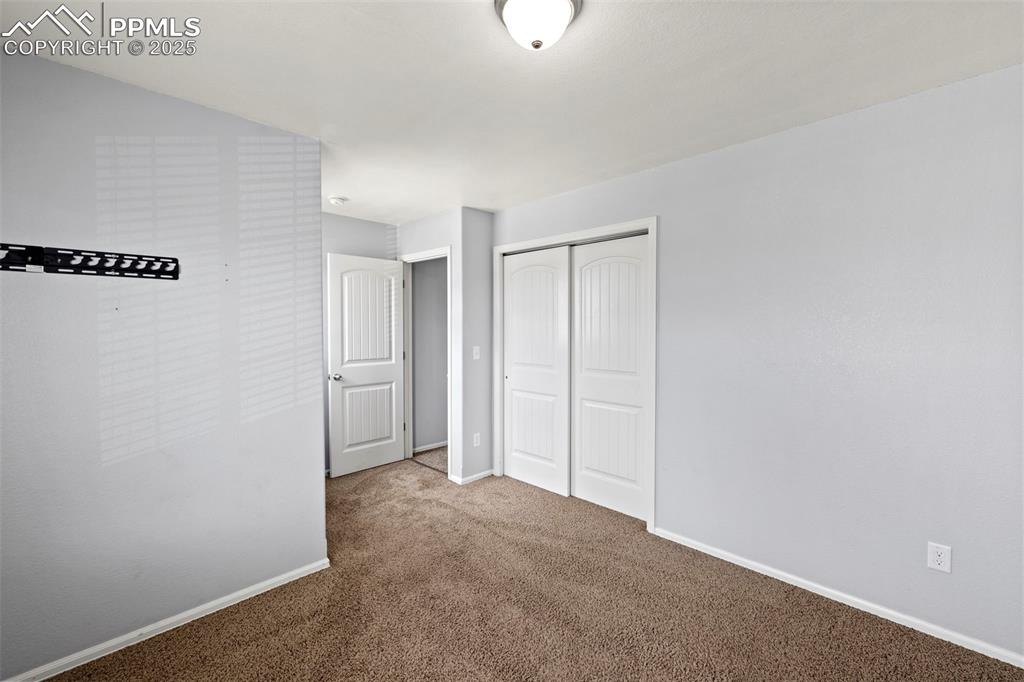 Image 31 of 38: Bedroom