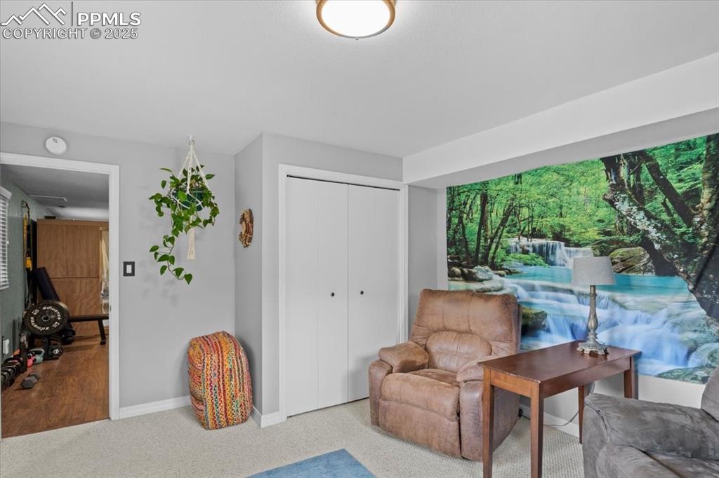 Image 34 of 49: Sitting room featuring baseboards
