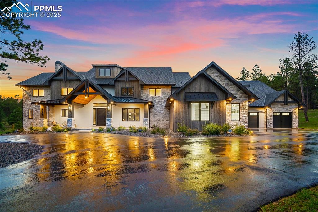 Image 48 of 49: Stunning view of custom home built by Palmer Ridge Contruction