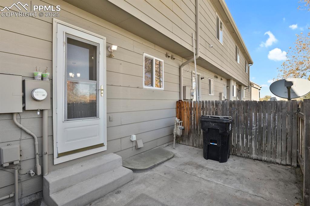 Image 24 of 27: View of patio with entry steps