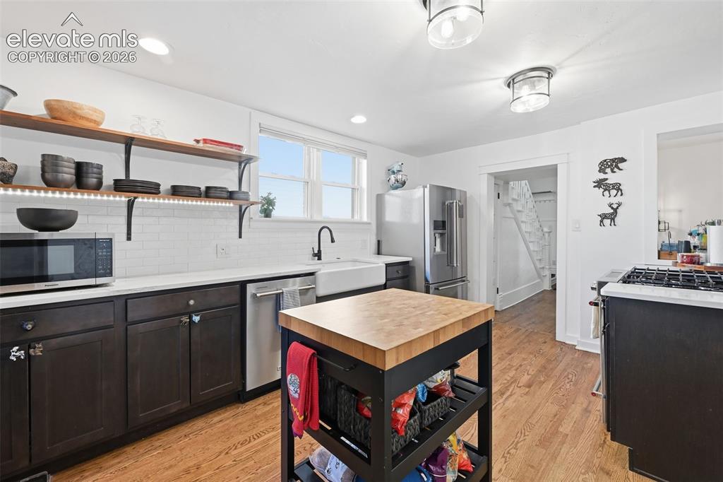 Image 14 of 50: This home is filled with elegant charms, like
the original staircase
and