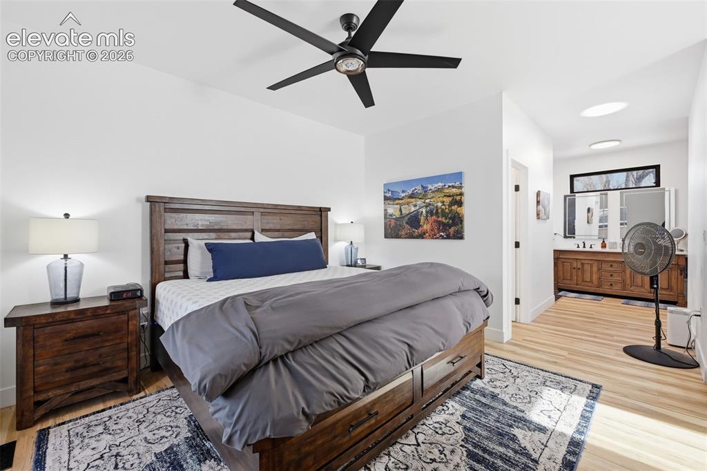 Image 19 of 50: Primary retreat
provides ample room
for a king-sized bed,
and a sitting