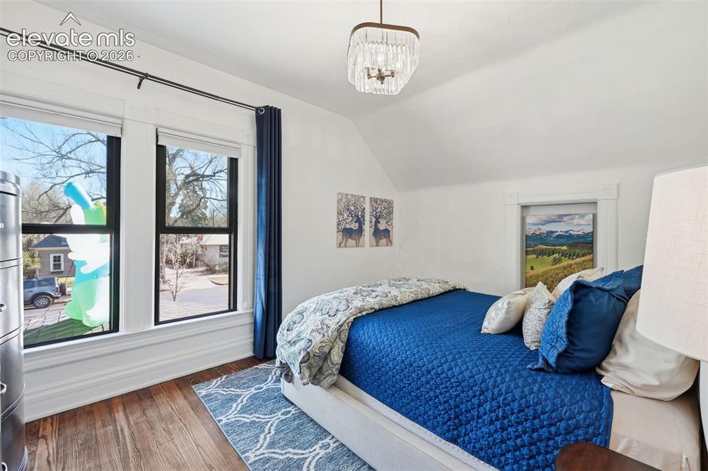 Image 23 of 50: Original hardwood
floors and a large 7 x 5 walk-in closet.