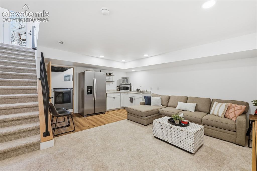 Image 26 of 50: This newly remodeled
basement apartment
has a separate
entrance. - Comes