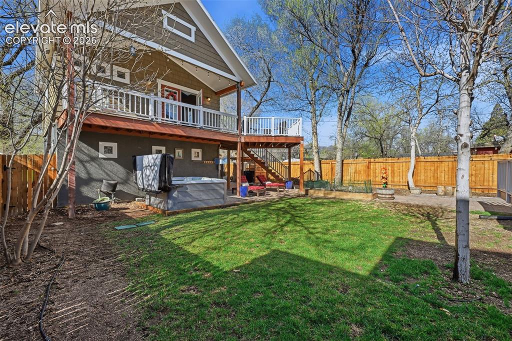 Image 33 of 50: Multiple deck and hot
tub help create the
perfect location to
spend your