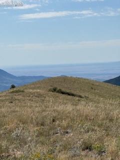 Caption: View of mountain background with a nearby body of water