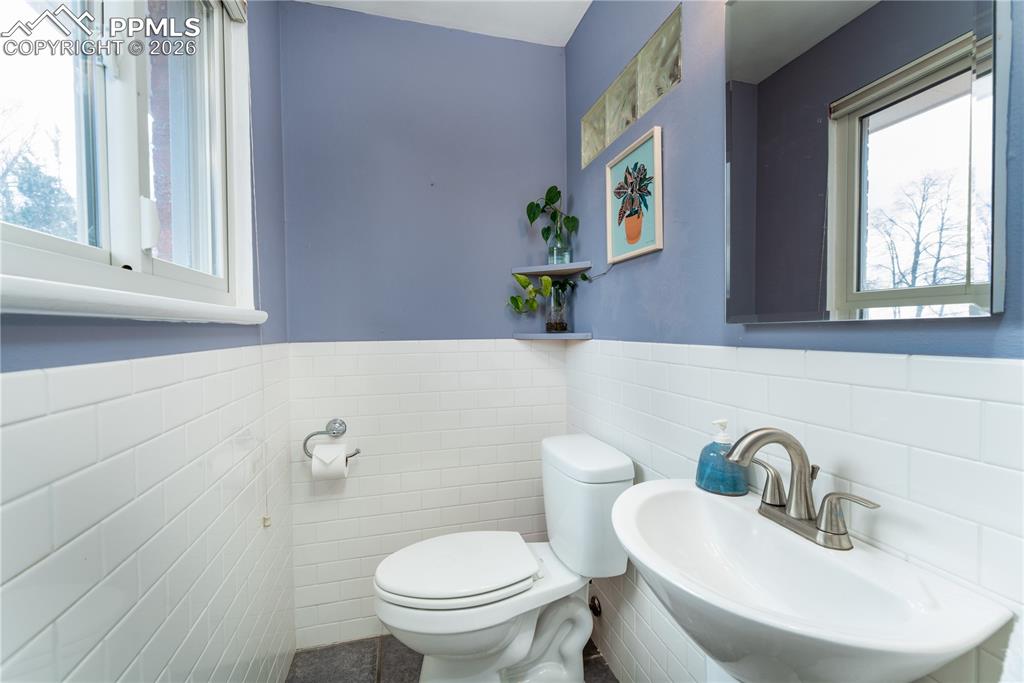 Image 8 of 27: upstairs 1/2 bath