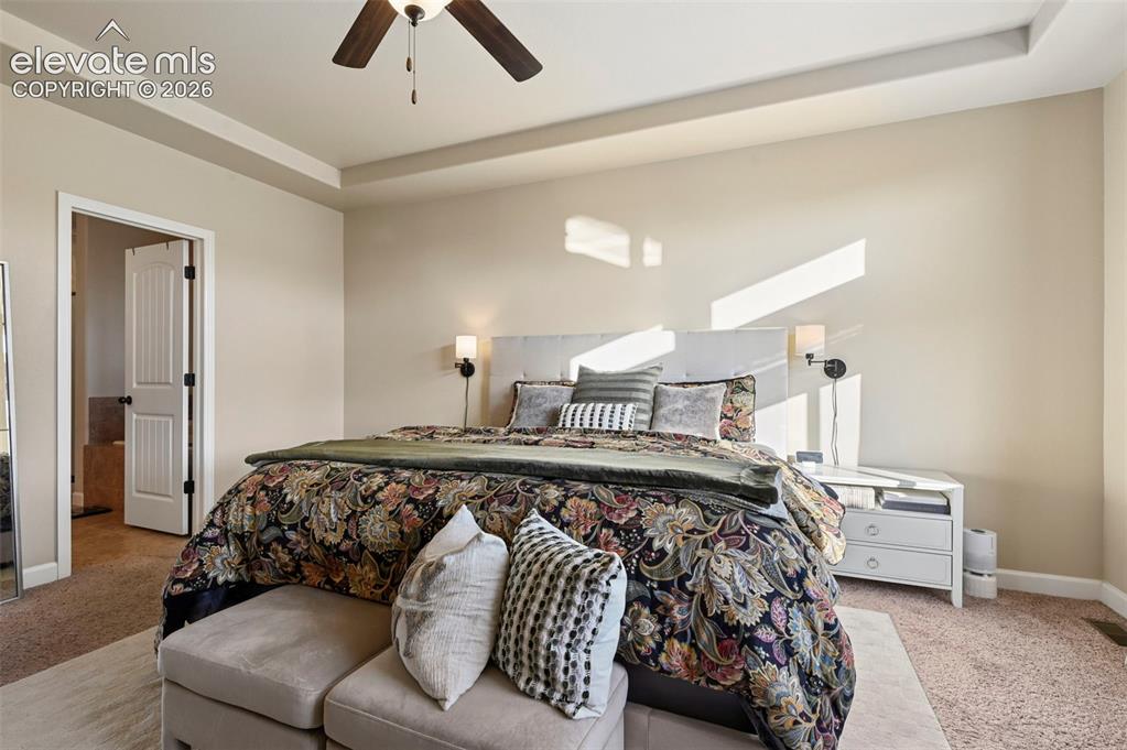 Image 17 of 47: Tray ceiling with recessed lighting