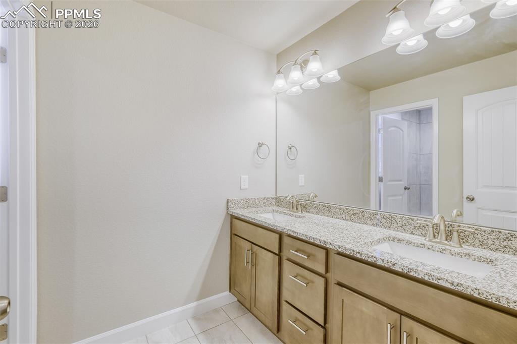 Image 29 of 42: upper level second bathroom