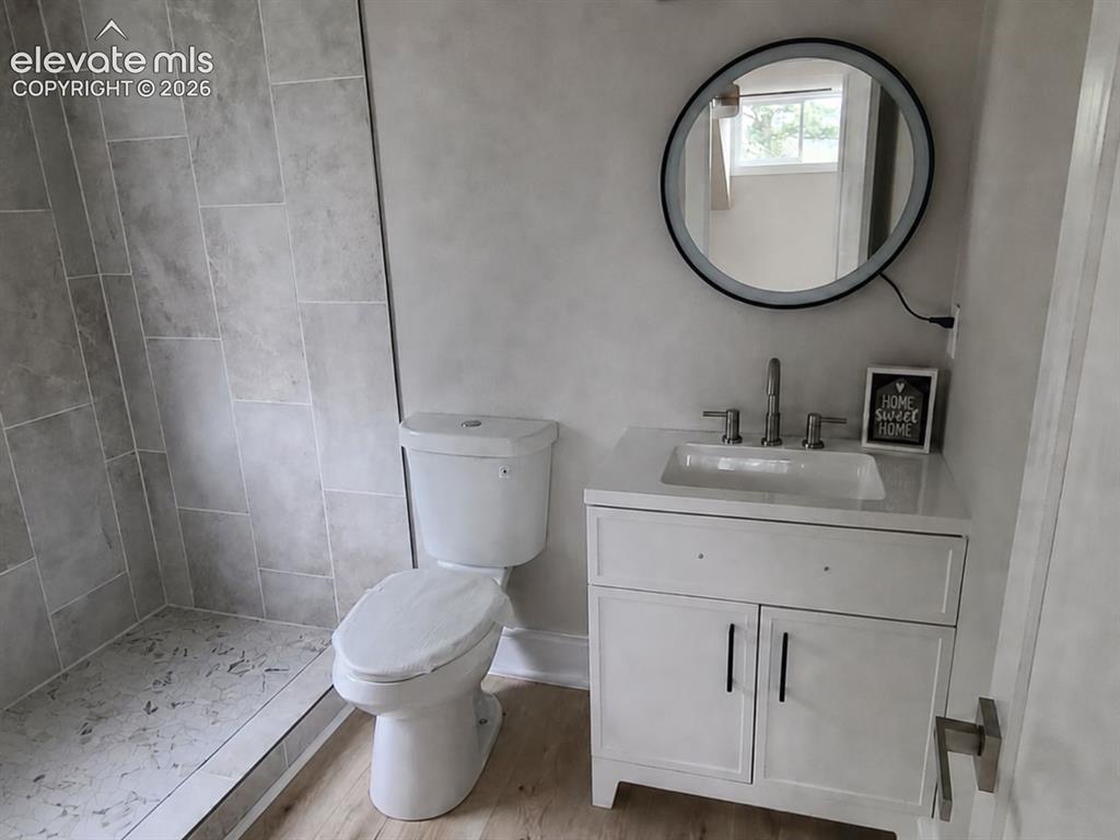 Image 24 of 27: Primary attached bathroom.