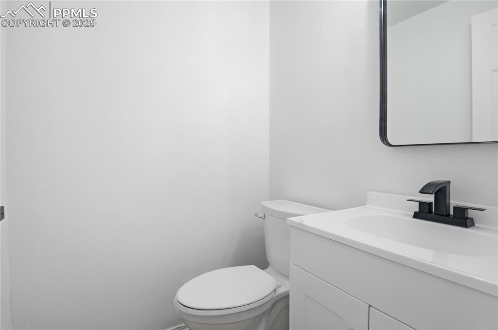 Image 17 of 42: Bathroom with vanity and toilet