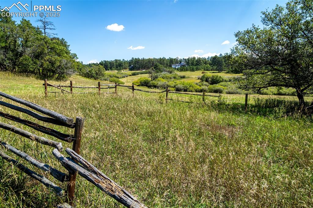 Image 7 of 18: View of yard with a view of countryside