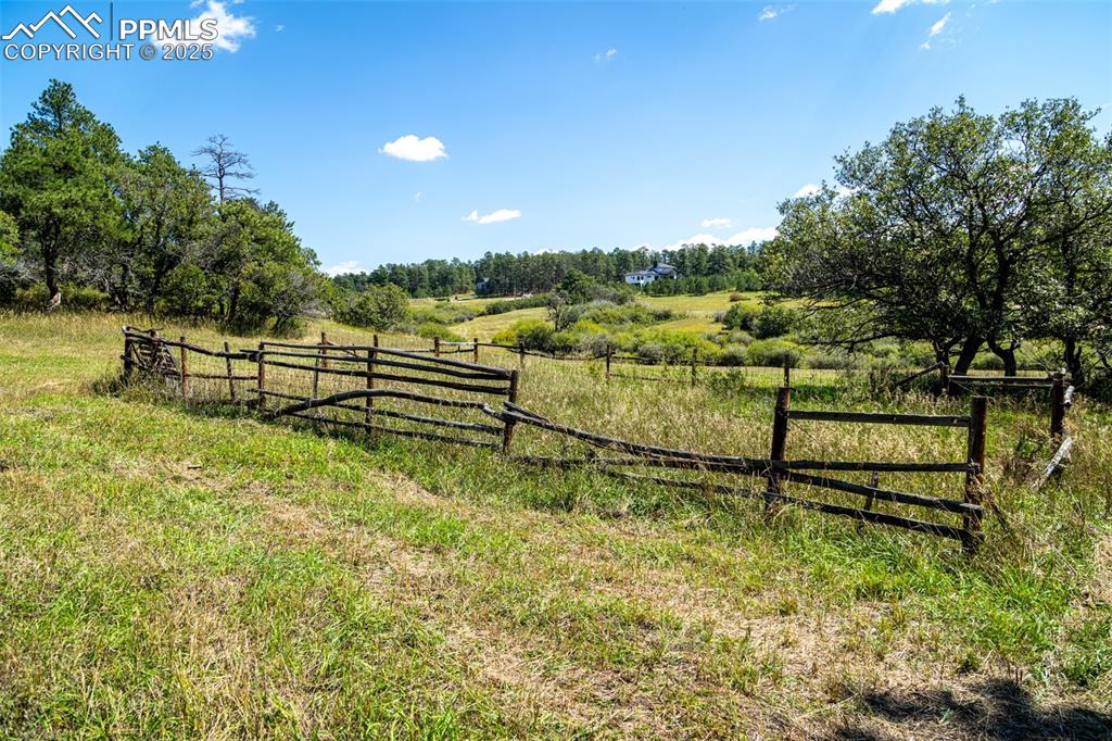 Image 9 of 18: Gate featuring a rural view