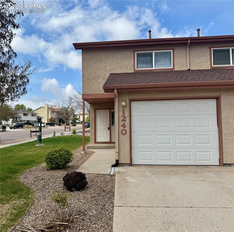 Image 1 of 18: End unit with common area lawn right outside your front door!